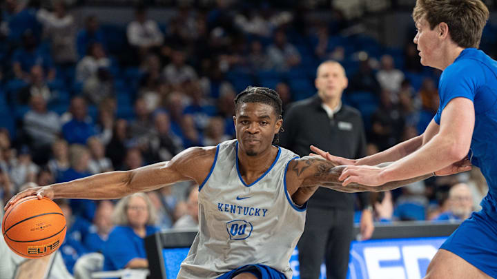 Kentucky Wildcats guard Otega Oweh (0) makes his way to the basket against Trent Noah (9) during the Kentucky Blue-White preseason event on Friday, Oct. 18, 2024 at the Memorial Coliseum.