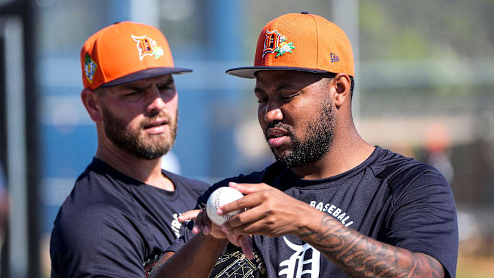 Detroit Tigers pitcher Dylan Smith, right, talks to pitcher Tanner Rainey at practice during spring training at TigerTown in Lakeland, Fla. on Friday, Feb. 20, 2026.
