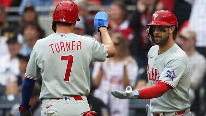 May 16, 2026; Pittsburgh, Pennsylvania, USA; Philadelphia Phillies first baseman Bryce Harper (right) greets shortstop Trea Turner (7) after Turner scored a run on a Pittsburgh Pirates error during the second inning at PNC Park.