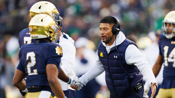 Notre Dame head coach Marcus Freeman celebrates after a touchdown in the first half of a NCAA football game against Syracuse at Notre Dame Stadium on Saturday, Nov. 22, 2025, in South Bend.
