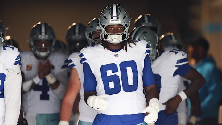 Oct 12, 2025; Charlotte, North Carolina, USA; Dallas Cowboys offensive tackle Tyler Guyton (60) prepares to enter the field prior to the game against the Carolina Panthers at Bank of America Stadium. Mandatory Credit: Cory Knowlton-Imagn Images