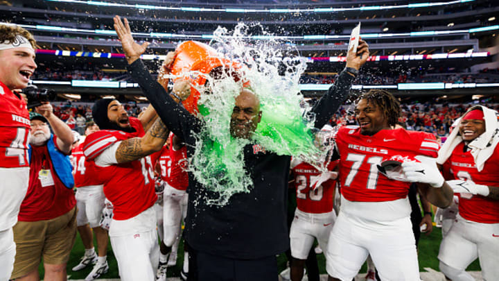 UNLV dumps Gatorade on interim coach Del Alexander after winning the LA Bowl.