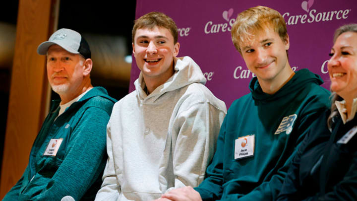 Cooper Flagg, his father, twin brother and mother answer questions at the Ronald McDonald House in North Carolina.