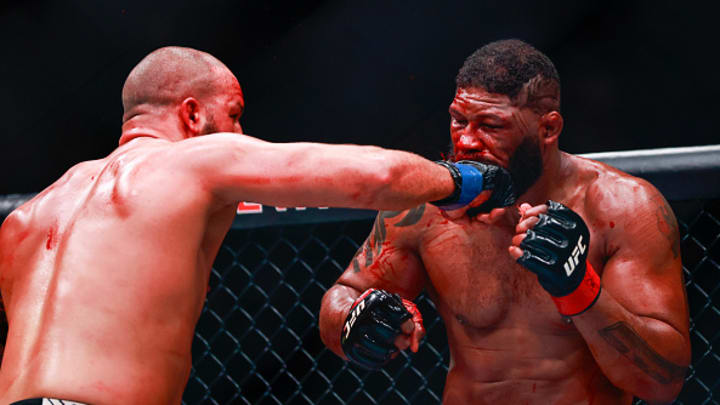 Josh Hokit punches Curtis Blaydes at UFC 327. Josh Hokit punches Curtis Blaydes at UFC 327.