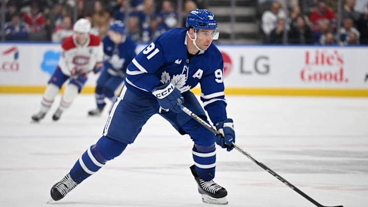 Apr 12, 2025; Toronto, Ontario, CAN; Toronto Maple Leafs forward John Tavares (91) skates with the puck against the Montreal Canadiens in the third period at Scotiabank Arena. Mandatory Credit: Dan Hamilton-Imagn Images Apr 12, 2025; Toronto, Ontario, CAN; Toronto Maple Leafs forward John Tavares (91) skates with the puck against the Montreal Canadiens in the third period at Scotiabank Arena. Mandatory Credit: Dan Hamilton-Imagn Images