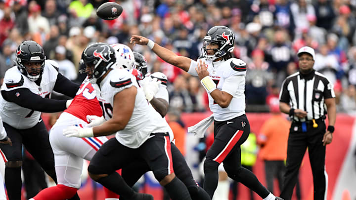 Oct 13, 2024; Foxborough, Massachusetts, USA; Houston Texans quarterback C.J. Stroud (7) throws against the New England Patriots during the first half at Gillette Stadium. Mandatory Credit: Brian Fluharty-Imagn Images