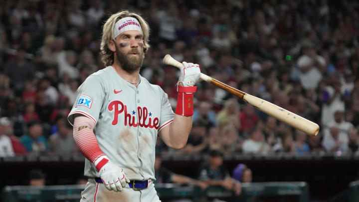 Aug 9, 2024; Phoenix, Arizona, USA; Philadelphia Phillies first base Bryce Harper (3) reacts after a high pitch in the ninth inning during a game against the Arizona Diamondbacks at Chase Field. Aug 9, 2024; Phoenix, Arizona, USA; Philadelphia Phillies first base Bryce Harper (3) reacts after a high pitch in the ninth inning during a game against the Arizona Diamondbacks at Chase Field.