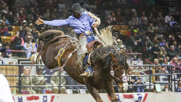 Saddle bronc riding action at NWSS
