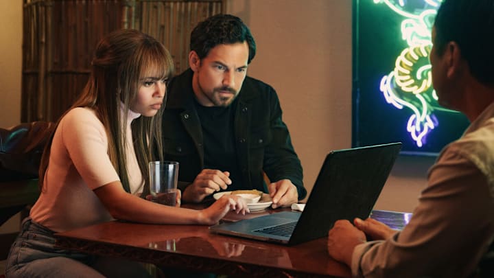 Wild Cards -- “The Infinity Thief” -- Image Number: WCD101c_0049r -- Pictured (L-R) : Vanessa Morgan as Max and Giacomo Gianniotti as Ellis -- Photo Credit: Ed Araquel/The CW -- © 2023 The CW Network, LLC. All Rights Reserved.