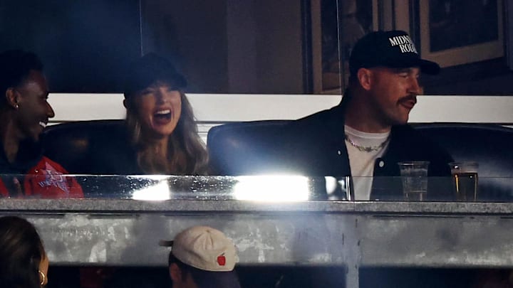 Oct 14, 2024; Bronx, New York, USA; Recording artist Taylor Swift and Kansas City Chiefs tight end Travis Kelce watch game one of the ALCS for the 2024 MLB Playoffs between the New York Yankees and the Cleveland Guardians at Yankee Stadium. Mandatory Credit: Vincent Carchietta-Imagn Images
