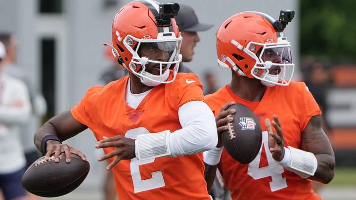 Cleveland Browns quarterbacks Shedeur Sanders (right) and Deshaun Watson take part in a drill on June 9 at CrossCountry Mortgage Campus of the Cleveland Browns in Berea, Ohio. Cleveland Browns quarterbacks Shedeur Sanders (right) and Deshaun Watson take part in a drill on June 9 at CrossCountry Mortgage Campus of the Cleveland Browns in Berea, Ohio.