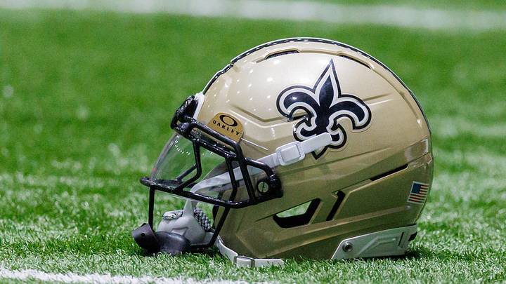 Aug 02, 2026; Metairie, LA, USA; Detailed view of the New Orleans Saints helmet during training camp at Ochsner Sports Performance Center. Mandatory Credit: Stephen Lew-Imagn Images Aug 02, 2026; Metairie, LA, USA; Detailed view of the New Orleans Saints helmet during training camp at Ochsner Sports Performance Center. Mandatory Credit: Stephen Lew-Imagn Images