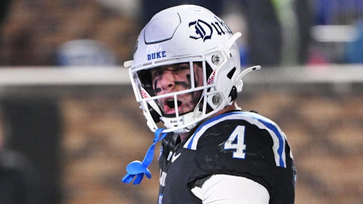 Nov 29, 2025; Durham, North Carolina, USA;  Duke Blue Devils running back Anderson Castle (4) celebrates a touchdown during the third quarter against the Wake Forest Demon Deacons at Wallace Wade Stadium. Mandatory Credit: Zachary Taft-Imagn Images