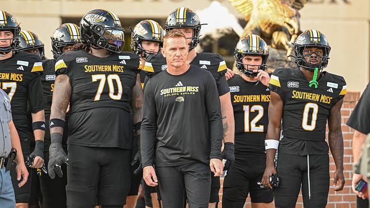 Southern Miss HC Blake Anderson leads his team out onto the field before Week 3's matchup against UConn. Southern Miss HC Blake Anderson leads his team out onto the field before Week 3's matchup against UConn.