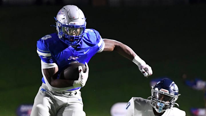 Byrnes Rebels Tre Segarra (3) breaks the tackle of Dorman Cavaliers Donovan Anderson (0) Friday, Sept. 26, 2025 during SCHSL football game at Byrnes High School in Duncan, South Carolina.