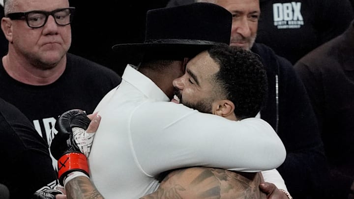 Gable Steveson celebrates with former UFC fighter Jon Jones after defeating Billy Swanson in a Dirty Boxing Championship heavyweight fight at The Pinnacle Thursday, Oct. 30, 2025, in Nashville, Tenn.