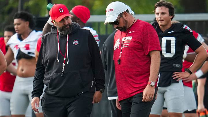 Ohio State Buckeyes defensive coordinator Matt Patricia talks to head coach Ryan Day during the first practice of training camp at the Woody Hayes Athletic Center in Columbus on Aug. 6, 2026.