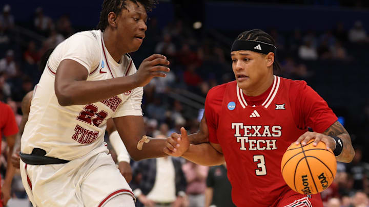 Lejuan Watts (3) of Texas Tech dribbles against Alabama  forward Aiden Sherrell (22) in the NCAA Tournament.