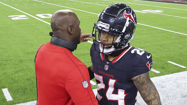 Jan 11, 2025; Houston, Texas, USA; Houston Texans head coach DeMeco Ryans embraces cornerback Derek Stingley Jr. (24) after a Stingley interception during the game against the Los Angeles Chargers in an AFC wild card game at NRG Stadium. Mandatory Credit: Troy Taormina-Imagn Images