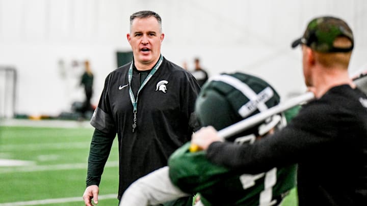 Michigan State's head coach Pat Fitzgerald instructs players during spring football practice on Tuesday, March 24, 2026, in East Lansing.