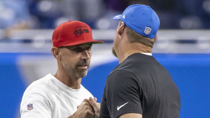 Sep 12, 2021; Detroit, Michigan, USA; San Francisco 49ers head coach Kyle Shanahan shakes hands with Detroit Lions head coach Dan Campbell after the game at Ford Field. Mandatory Credit: David Reginek-Imagn Images Sep 12, 2021; Detroit, Michigan, USA; San Francisco 49ers head coach Kyle Shanahan shakes hands with Detroit Lions head coach Dan Campbell after the game at Ford Field. Mandatory Credit: David Reginek-Imagn Images