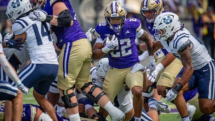 Trey Cooley looks for room to run against Utah State. Trey Cooley looks for room to run against Utah State.