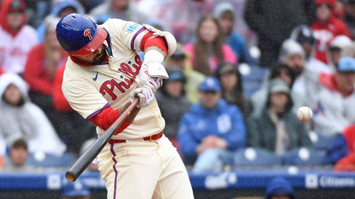 Apr 6, 2025; Philadelphia, Pennsylvania, USA; Philadelphia Phillies outfielder Nick Castellanos (8) hits a grand slam during the third inning against the Los Angeles Dodgers home run at Citizens Bank Park. 
