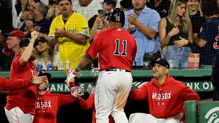 Sep 14, 2023; Boston, Massachusetts, USA; Boston Red Sox designated hitter Rafael Devers (11) celebrates his home run against the New York Yankees with manager Alex Cora (13) during the third inning at Fenway Park. Mandatory Credit: Eric Canha-Imagn Images Sep 14, 2023; Boston, Massachusetts, USA; Boston Red Sox designated hitter Rafael Devers (11) celebrates his home run against the New York Yankees with manager Alex Cora (13) during the third inning at Fenway Park. Mandatory Credit: Eric Canha-Imagn Images