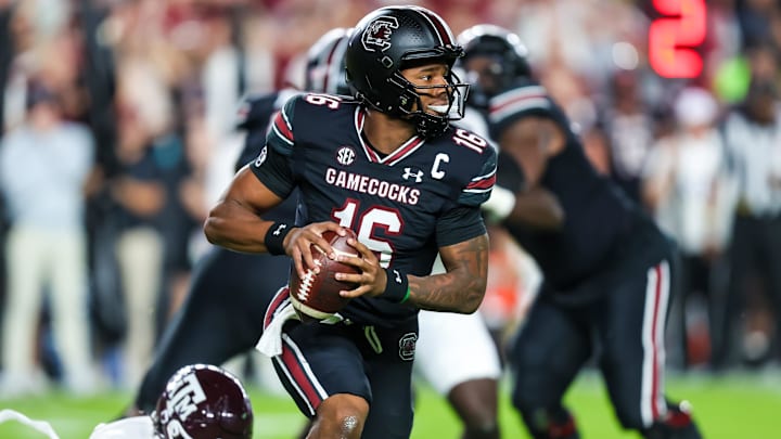 Nov 2, 2024; Columbia, South Carolina, USA; South Carolina Gamecocks quarterback LaNorris Sellers (16) scrambles against the Texas A&M Aggies in the first quarter at Williams-Brice Stadium. Mandatory Credit: Jeff Blake-Imagn Images