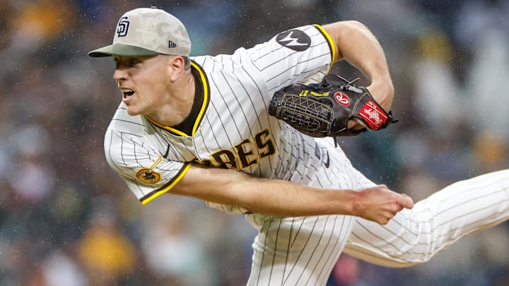 May 17, 2025; San Diego, California, USA; San Diego Padres starting pitcher Nick Pivetta (27) throws a pitch during the fifth inning against the Seattle Mariners at Petco Park. Mandatory Credit: David Frerker-Imagn Images