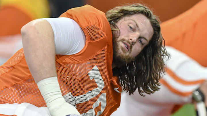 Clemson offensive lineman Blake Miller (78) stretches during the football practice at the Allen N. Reeves Football Complex at Clemson University in Clemson, S.C. Monday, March 3, 2025.