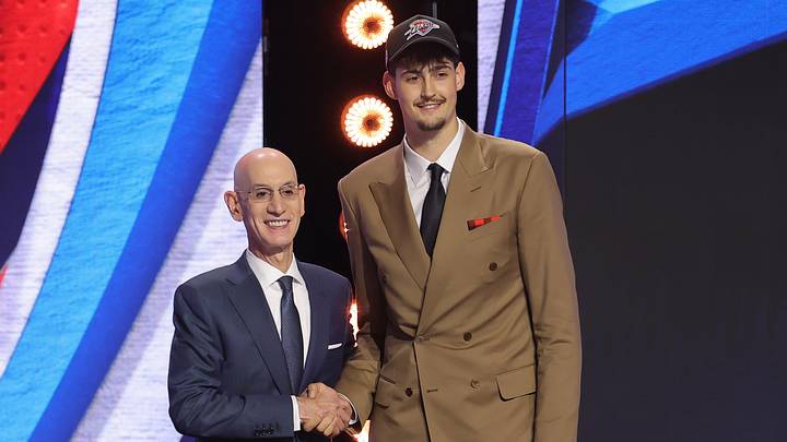 Jun 23, 2026; New York, NY, USA; NBA commissioner Adam Silver greets the twelfth pick in the 2026 NBA draft, Michigan center Aday Mara after he was selected by the Oklahoma City Thunder at Barclays Center. Mandatory Credit: Brad Penner-Imagn Images