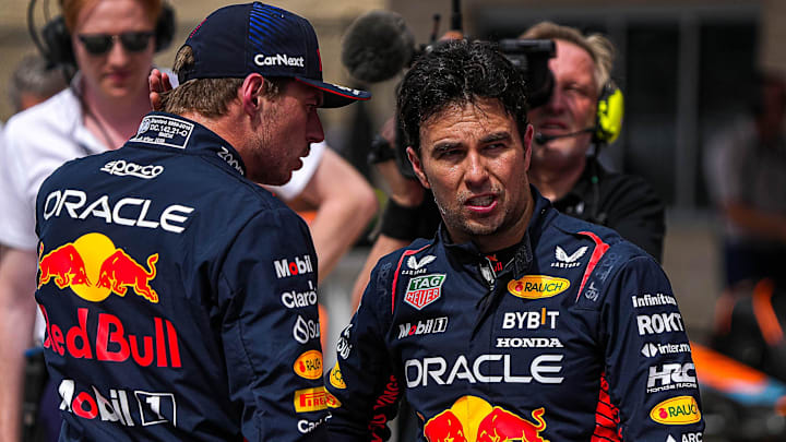Oracle Red Bull Racing driver Max Verstappen, left, talks to Sergio Perez, right, after the Sprint Oracle Red Bull Racing driver Max Verstappen, left, talks to Sergio Perez, right, after the Sprint