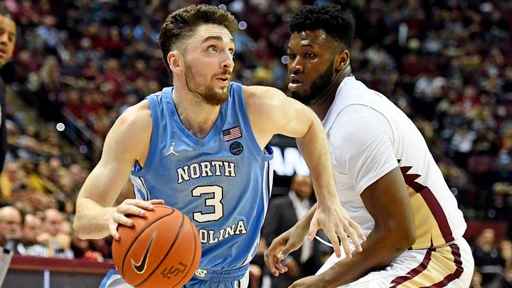 Feb 3, 2020; Tallahassee, Florida, USA; North Carolina Tar Heels guard Andrew Platek (3)  drives to the basket against Florida State Seminoles forward Raiquan Gray (1) during the second half at Donald L. Tucker Center. Mandatory Credit: Melina Myers-USA TODAY Sports
