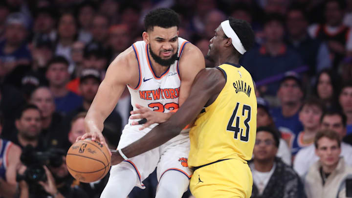May 23, 2025; New York, New York, USA; New York Knicks center Karl-Anthony Towns (32) controls the ball against Indiana Pacers forward Pascal Siakam (43) in the second quarter during game two of the eastern conference finals for the 2025 NBA Playoffs at Madison Square Garden. Mandatory Credit: Wendell Cruz-Imagn Images