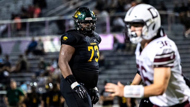 Cedar Rapids Kennedy's Nick Brooks (73) get set before a play during a Class 5A high school football game against Dowling Catholic, Saturday, Aug. 26, 2023, at Kingston Stadium in Cedar Rapids, Iowa.