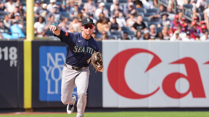 Aug 13, 2026; Bronx, New York, USA; Seattle Mariners shortstop Colt Emerson (4) throws out New York Yankees left fielder Heliot Ramos (34) (not pictured) after fielding a ground ball during the eighth inning at Yankee Stadium. Mandatory Credit: Gregory Fisher-Imagn Images