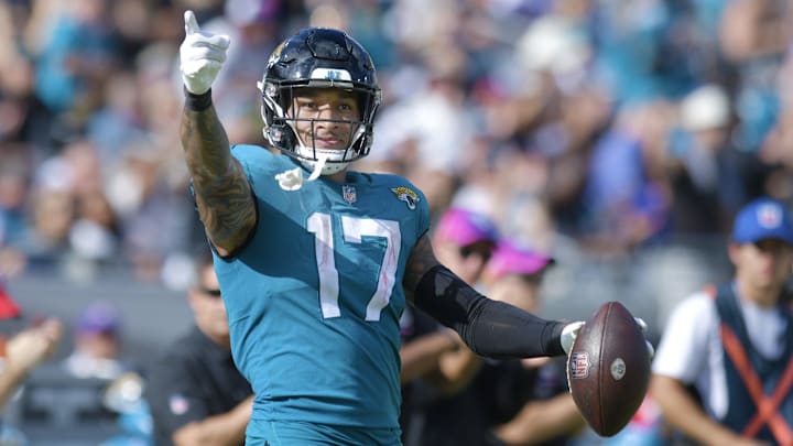 Jacksonville Jaguars tight end Evan Engram (17) signals a first down after an early fourth quarter.