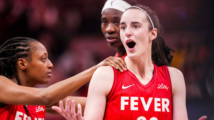 Indiana Fever guard Caitlin Clark (22) reacts to receiving a flagrant foul Saturday, May 17, 2025, during a game between the Indiana Fever and the Chicago Sky at Gainbridge Fieldhouse in Indianapolis. The Indiana Fever defeated the Chicago Sky, 93-58.