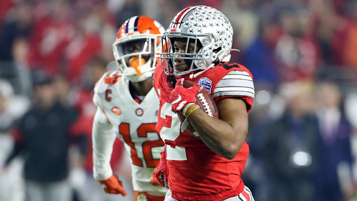 Dec 28, 2019; Glendale, AZ, USA;
Ohio State Buckeyes running back J.K. Dobbins (2) runs for a 68-yard touchdown past Clemson Tigers safety K'Von Wallace (12) in the first half in the 2019 Fiesta Bowl college football playoff semifinal game at State Farm Stadium. Mandatory Credit: Darryl Webb/Arizona Republic via USA TODAY NETWORK
Ncaa Football College Football Playoff Semifinal Ohio State Vs Clemson Dec 28, 2019; Glendale, AZ, USA;
Ohio State Buckeyes running back J.K. Dobbins (2) runs for a 68-yard touchdown past Clemson Tigers safety K'Von Wallace (12) in the first half in the 2019 Fiesta Bowl college football playoff semifinal game at State Farm Stadium. Mandatory Credit: Darryl Webb/Arizona Republic via USA TODAY NETWORK
Ncaa Football College Football Playoff Semifinal Ohio State Vs Clemson