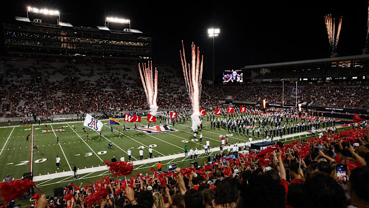 Aug 30, 2025; Tucson, Arizona, USA; Arizona Wildcats team runs out before the start of the Hawaii Rainbow Warriors at the Arizona Stadium. Mandatory Credit: Aryanna Frank-Imagn Images