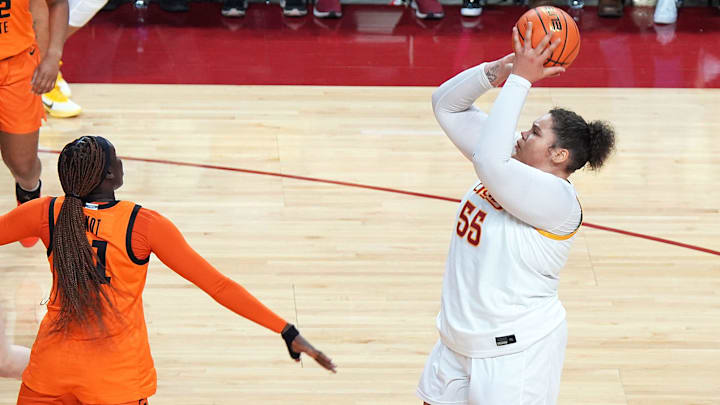 Iowa State Cyclones' center Audi Crooks (55) shoots the ball over Oklahoma State Cowgirls forward Achol Akot (11) during the third quarter in the senior day women basketball at Hilton Coliseum on February. 25, 2026, in Ames, Iowa.