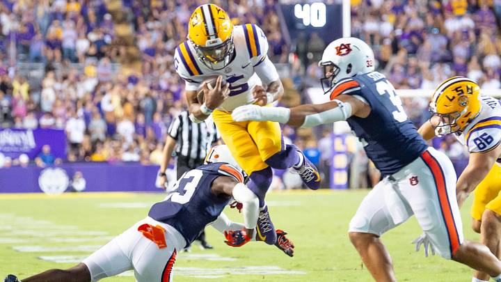 Tigers Quarterback Jayden Daniels 5 runs the ball as the LSU Tigers take on the Auburn Tigers at Tiger Stadium in Baton Rouge, Louisiana, Saturday, Oct. 14, 2023.