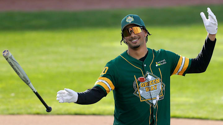 Jordan Love reacts after winning then home run derby during the Green Bay Charity Softball Game in 2024.