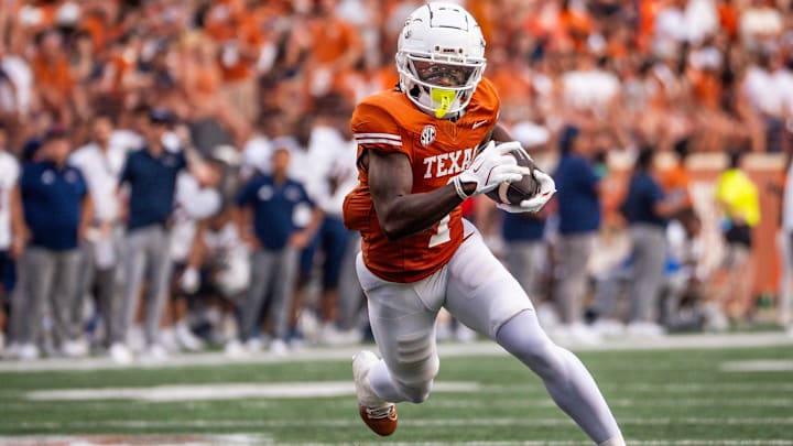 Sep 14, 2024; Austin, Texas, USA; Texas Longhorns wide receiver Johntay Cook II (1) runs the ball for a touchdown against the UTSA Roadrunners in the first quarter at Darrell K Royal–Texas Memorial Stadium. Mandatory Credit: Sara Diggins/USA TODAY Network via Imagn Images