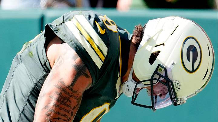 Green Bay Packers wide receiver Christian Watson (9) celebrates after catching a first-quarter touchdown pass against the Bears.