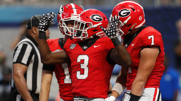 Georgia running back Nate Frazier (3) celebrates after scoring a touchdown during the second half of the NCAA Aflac Kickoff Game against Clemson in Atlanta, on Saturday, Aug. 31, 2024.