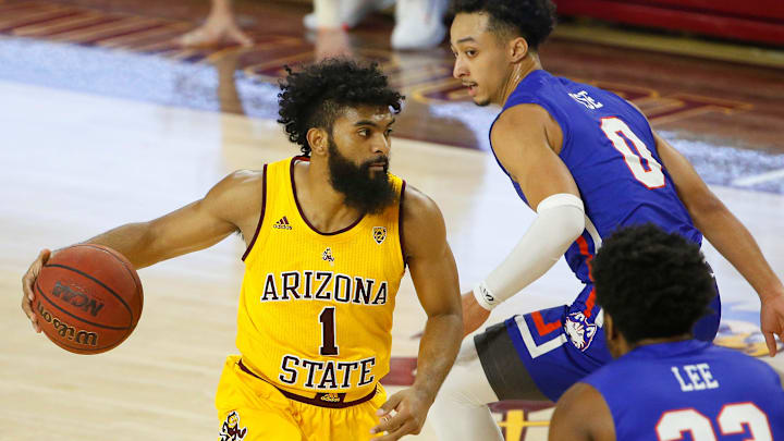 ASU's Remy Martin (1) drives against HBU's Jade Tse (0) and Darius Lee (23) during the first half at Desert Financial Arena in Tempe, Ariz. on Nov. 27, 2020.
Houston Baptist At Arizona State ASU's Remy Martin (1) drives against HBU's Jade Tse (0) and Darius Lee (23) during the first half at Desert Financial Arena in Tempe, Ariz. on Nov. 27, 2020.
Houston Baptist At Arizona State