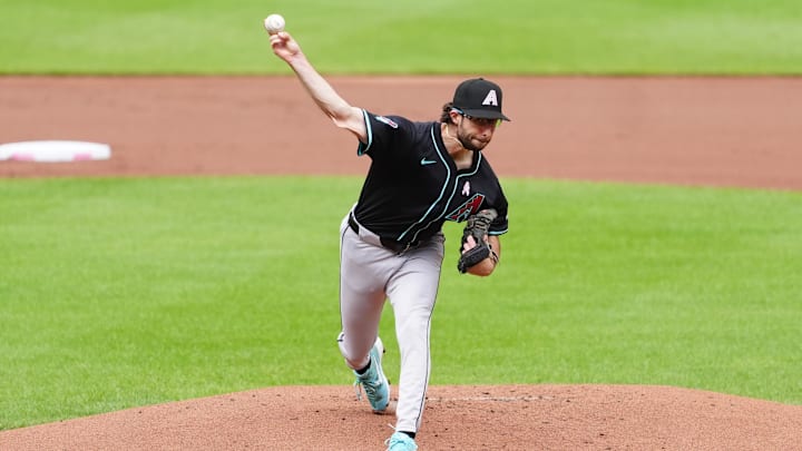 May 12, 2024; Baltimore, Maryland, USA; Arizona Diamondbacks pitcher Zac Gallen (23) delivers a pitch against the Baltimore Orioles during the first inning at Oriole Park at Camden Yards. Mandatory Credit: Gregory Fisher-USA TODAY Sports