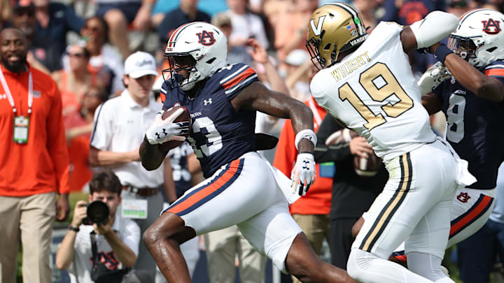 Auburn Tigers tight end Rivaldo Fairweather breaks free of Vanderbilt Commodores defenders and goes on to score a touchdown.
